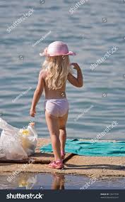 Little topless girl on beach|Little Girl Beach Photos - Download Free High-Quality Pictures | Freepik