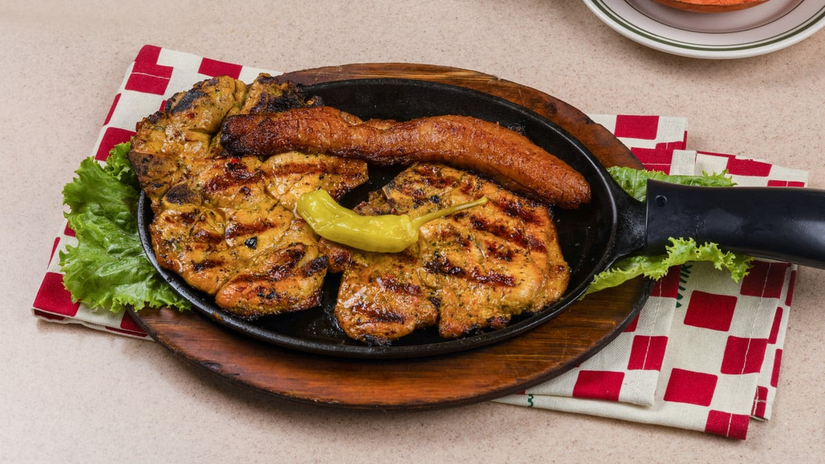 Pollos a la Brasa Mario by null