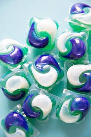 Gel capsule pods with laundry detergent on white jpg x Tide pod