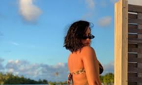 demi lovato bikini|Demi Lovato poses in sheer white swimsuit on birthday trip