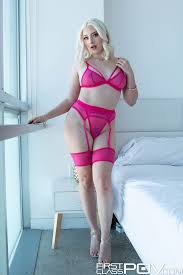 Blonde slut wears pink lingerie while posing in the bedroom photos jpg x Pink lingerie blonde