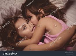 two little girls kissing|Two Sweet Girls, The Little Sisters With A Sweet Relationship. Sisters  Kiss. Stock Photo, Picture and Royalty Free Image. Image 141625133.