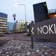 Nokia says completion of Microsoft deal is delayed until April