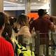 Airport worker punches Easyjet passenger holding a baby 