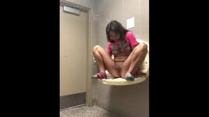 Public toilet masturbation of a sexy brunette teen babe jpg x Public toilet masturbation