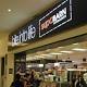 Supabarn announces plan to sell all but two ACT, NSW stores to Coles 