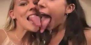 Interracial lesbian tongue kissing and snogging on the couch jpg x Tongue sucking