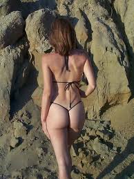 Blonde teen agatha removes a bikini to pose nude on a beach jpg x Bikini naked beach