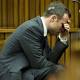 Pistorius's Ex-Girlfriend Says Kept Gun With Him at All Times