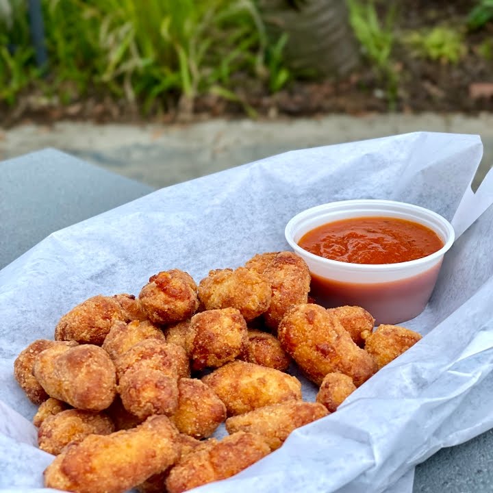 Fam's Brewing Co. featuring Famulari's Pizzeria by null