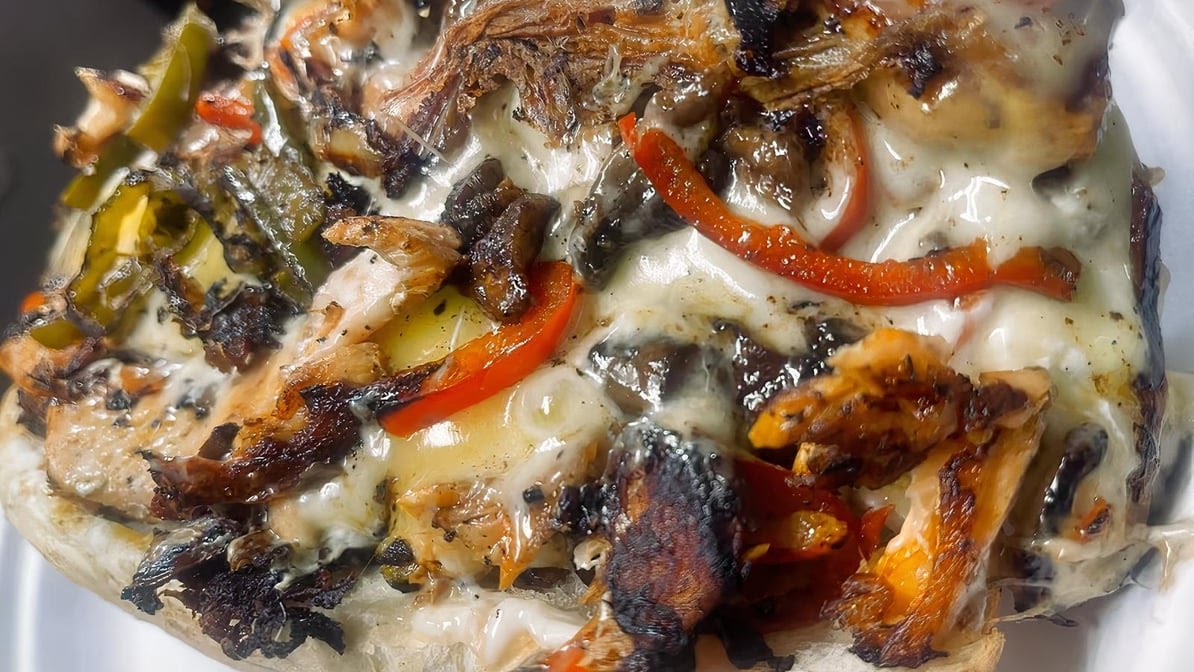 Tres’ House of Cheesesteaks by null