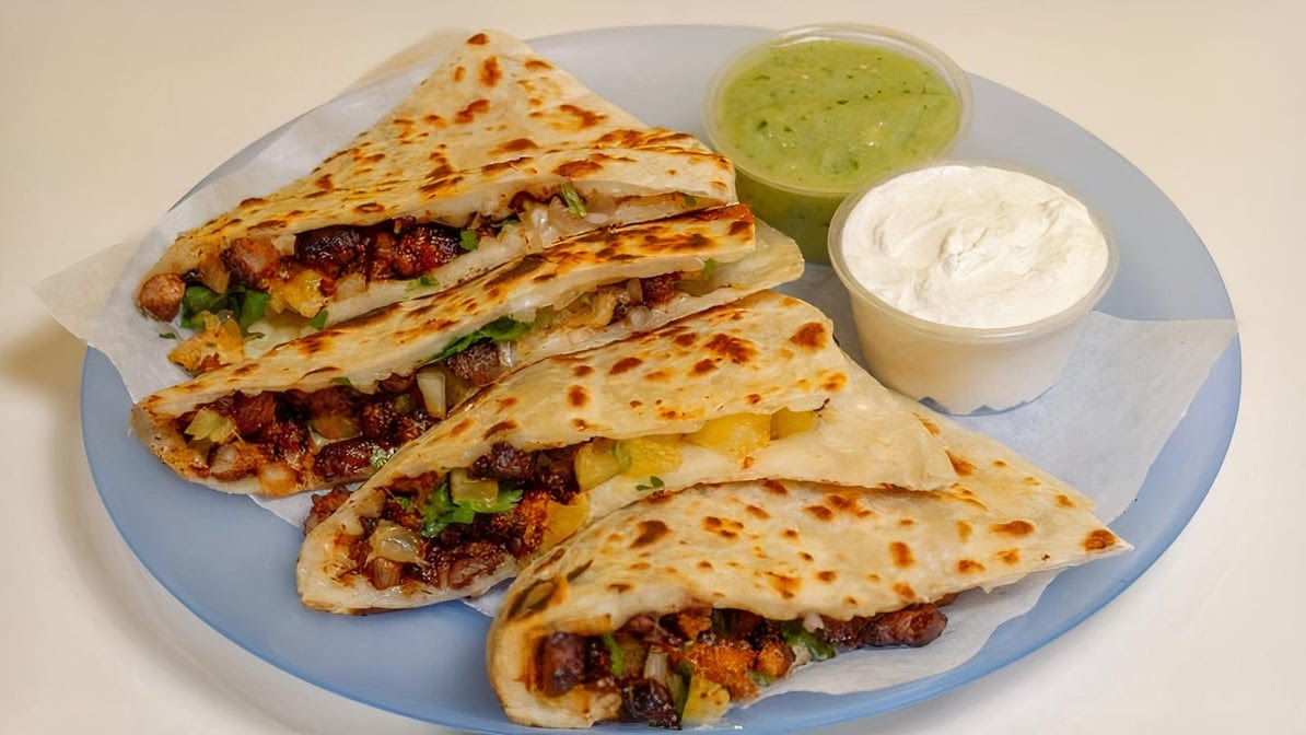 Carmelos Tacos by null