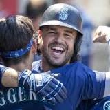 Mariners hit four homers in 11-7 win to sweep Angels in Anaheim