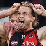 Sydney Swans lose forward Isaac Heeney to injury and 'just went to sleep' as Essendon pile on five unanswered goals ...