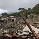 Eight killed in landslide on popular holiday island as rescuers hunt for missing