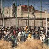Eighteen killed as throng of migrants storms Spain's Melilla border from Morocco