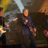 'Back together': Paul McCartney and John Lennon reunited at Glastonbury Festival