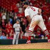 Albert Pujols makes first pitching appearance of his career, closes out St. Louis Cardinals' rout of San Francisco Giants