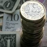 Sterling at 2-year low against dollar as Boris Johnson hangs on