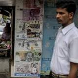 Indian rupee hits record low amid concerns over 'sustained inflation'