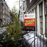 Amsterdamse woningmarkt koelt iets af, prijzen dalen licht