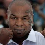 Mike Tyson has another angry interaction with fan when woman appears to try to pick his nose