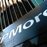 JPMorgan reports 28% drop in earnings and suspends share buybacks