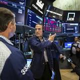 Dow drops 400 points on rate hikes, China factory slowdowns